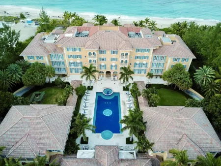 VILLA RENAISSANCE 603, 1BR in Grace Bay. Steps to the sand. WOW Отели рядом с достопримечательностью «Turks and Caicos Map Mural»