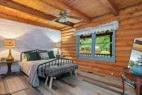 Cabin on 35 acres w/private lake for fishing, fenced yard, hot tub, pool table