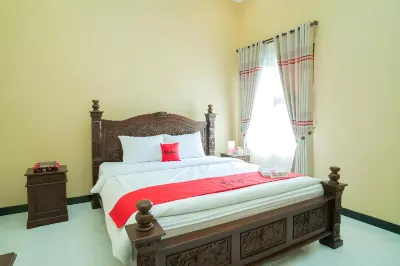 RedDoorz Syariah Near Rsud Kota Malang Hotel in zona Kepanjen View Sawah Rel Jembatan