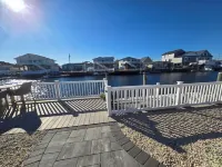 Beautifully updated waterfront home great for families & friends +beach badges.