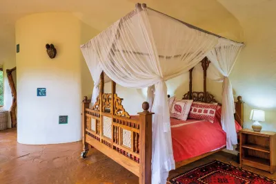 An exclusive, family-friendly retreat with a mix of luxury tents and cottages. Hotel a 