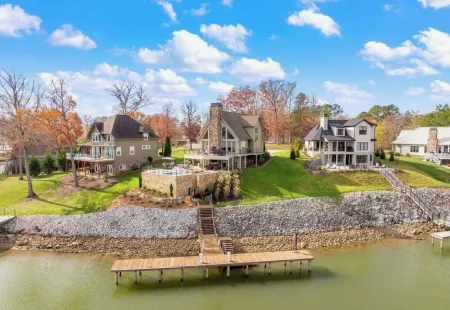 Luxurious Lakefront Home with a Private Saltwater Pool, Spa, & Deep-Water Dock