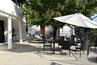 Dendrokipos - traditional stone house on the east side of Pelion Hotels in Mouresi