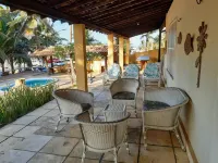 House in Praia do Coqueiro, facing the sea, close to the best tents. Hotels in Coqueiro