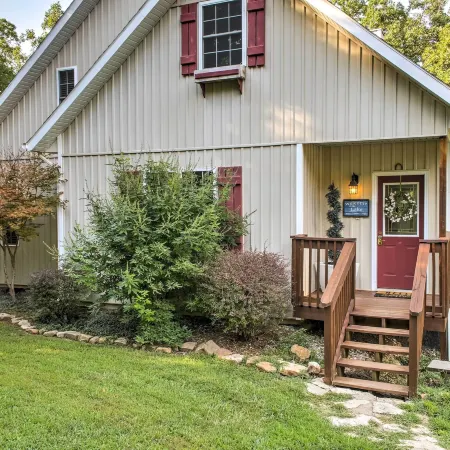 Hot Tub & Wooded Views: Lakefront Blue Eye Cottage