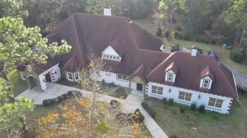 Escape to this serene 4-bedroom home set on 10 private acres.