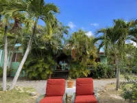 The Greenside Cottages - Private Tropical Garden - Residential Area 5 Mins from the Beach Hotel dekat V C Bird Monument