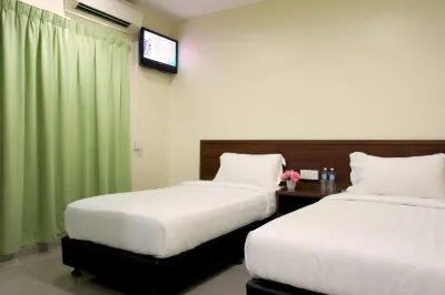 Maple Inn Hotel in zona Suasana Lumayan Condominium