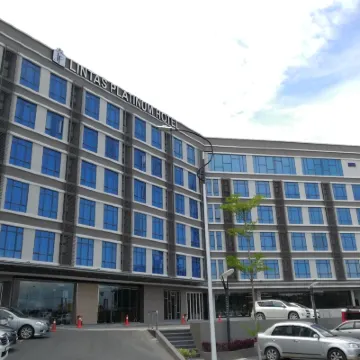 Lintas Platinum Hotel Hotels near Our Lady Queen Of Peace Catholic Church