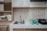 Modern and Relax Studio Room at Serpong Greenview Apartment by Travelio