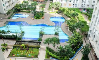 Clean 2Br Green Bay Apartment Near Baywalk Mall Pluit by Travelio