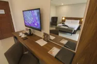 Mango Suites Cauayan Hotels near COCOPEA University of Perpetual Help System Laguna Isabela Campus