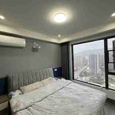 Xiaozhang Laile Apartment (Yuanshi Road No.1) Rooms