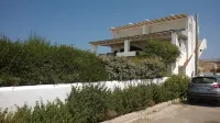 Typical Mediterranean home by the sea with large terrace