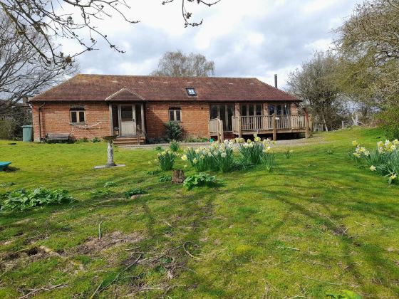 Converted stable in secluded rural setting.