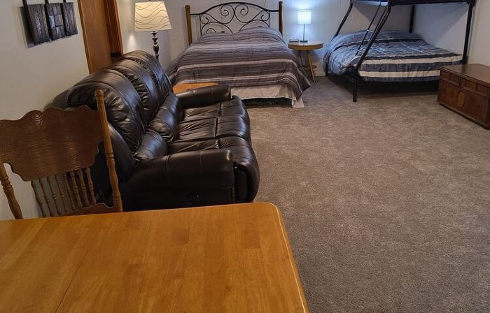 Beautiful cabin situated on wooded land with nice yard clearing and small stream