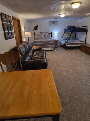 Beautiful cabin situated on wooded land with nice yard clearing and small stream