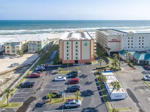 Beach Condo with King Bed, private beach, and heated pool