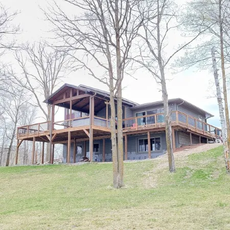 Private Newly Built Woman Lake Cabin with Detached Barn Style Bunk House