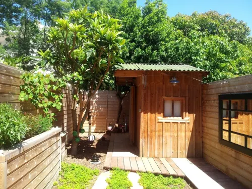 IN THE HEART OF CAP-FERRET LARGE APARTMENT WITH 140m2 GARDEN WITHDRAWAL 300M OCEAN Hoteles en Lège-Cap-Ferret