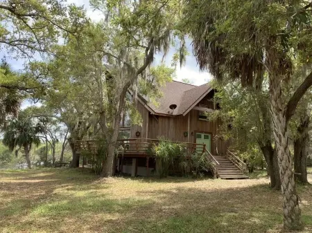 Luxurious house on secluded 3.8 acres, oak trees on Manatee River, large decks