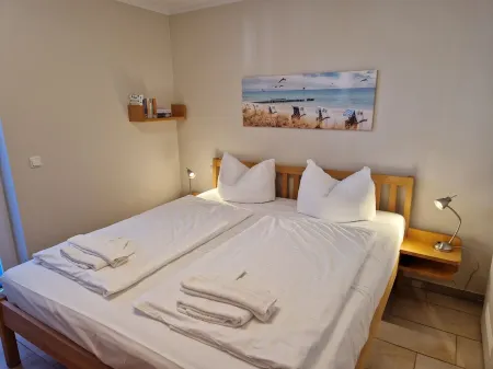 Holiday beachcomber, 50 m beach, beach chair, free Wi-Fi, 2 south-west-facing balconies