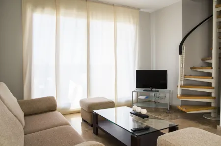 Apartamentos Plaza Picasso Отели в г. Horta of Valencia