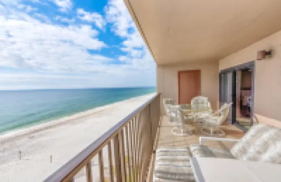 Beachfront condo with gulf/water views, central AC, balcony, W/D, & WiFi