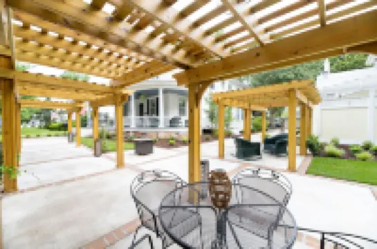 Charming Inn with Outdoor Trellis and Cozy Porch - Inviting Escape