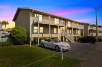 Shared Pool and Ocean View Balcony - Charming Coastal Oasis