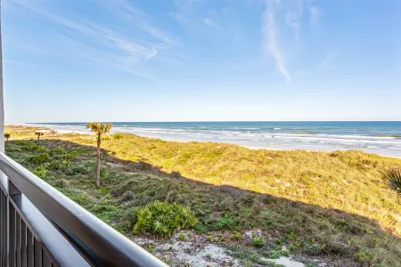 Scenic Balcony and Ample Amenities - Charming Coastal Retreat