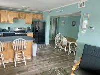 2nd Floor 3 BR Condo Close to the beach with Pool!