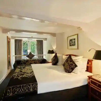 Ambassade Hotel Rooms