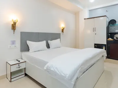 Divine Stays Hotels near Pink Square Mall