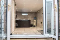 1-Bed Apartment with Private Hot Tub, Sauna & Gym Hotels in Dagenham