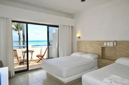 Pelicano Inn Playa del Carmen - Beachfront Hotel