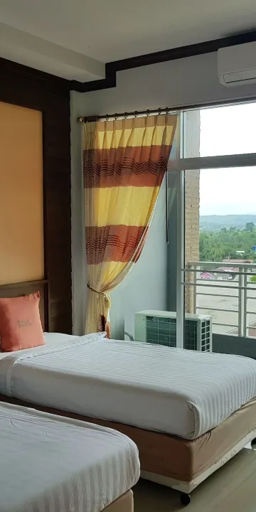 ห้องดีลักซ์ เตียงใหญ่ 1 เตียงหรือเตียงเดี่ยว 2 เตียง