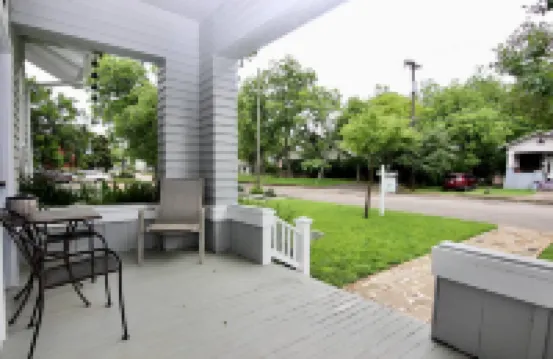 Private Backyard with Charcoal Grill and Porch - Charming Cozy Haven