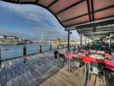 海豚碼頭公寓 曼哲拉酒店
