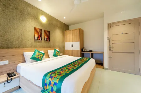 Treebo MR Motel Отели рядом с достопримечательностью «Uchatthu Kayam Riverside Picnic Spot»