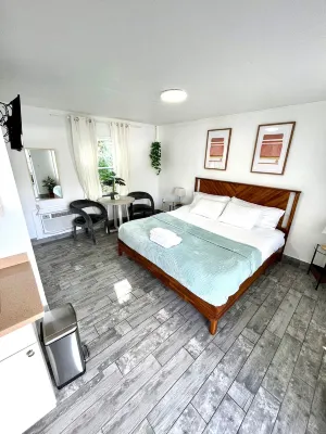 Shared Pool and Grilling Area with Mini Golf - Inviting Oasis