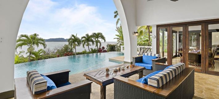 Dreamy Spanish-Style Villa with Sweeping Ocean Views, Elegant Nautical Design & Giant Infinity Pool Hotels in Playa Flamingo