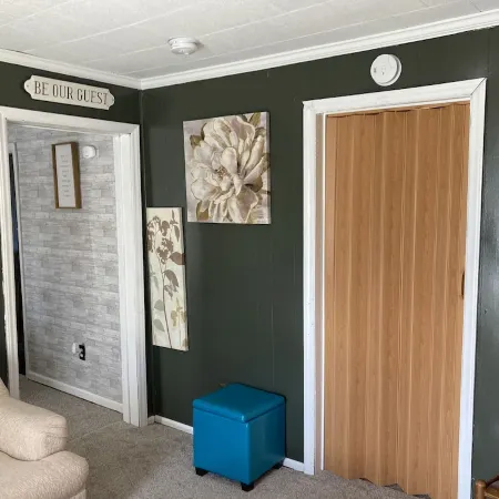 Updated bungalow with screened in porch in rear.