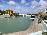Private condo, water views, great breezes, well appointed for divers