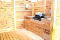 Sensational cabin with hot tub, sauna, fire place, 85" TV and magical views