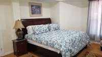 Beautiful 2BR Walkout Fenced & Gated Villa, Onsite parking, Pet friendly-2+acres