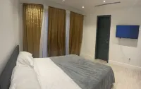 BRAND NEW 3 Bedroom luxury Condominium- 5 mins away from the beach!!1 spot!