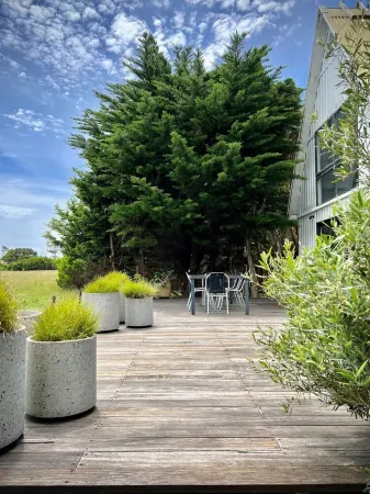 A shaped beach house located on the edge of Waratah Bay close Wilsons Promontory