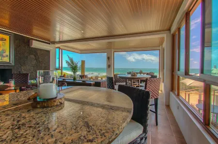 Iguana Crossing Boutique Hotel Отели в г. Исабела