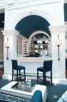 Parc Royale Suites Hotel - بار